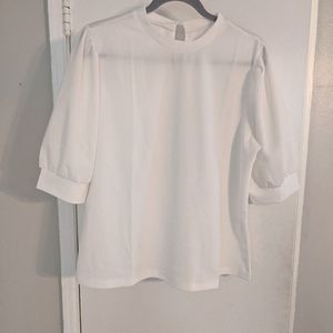 White blouse with button detail on back